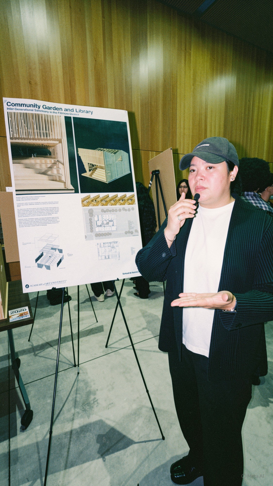 A student presenting the Community Garden and Library project