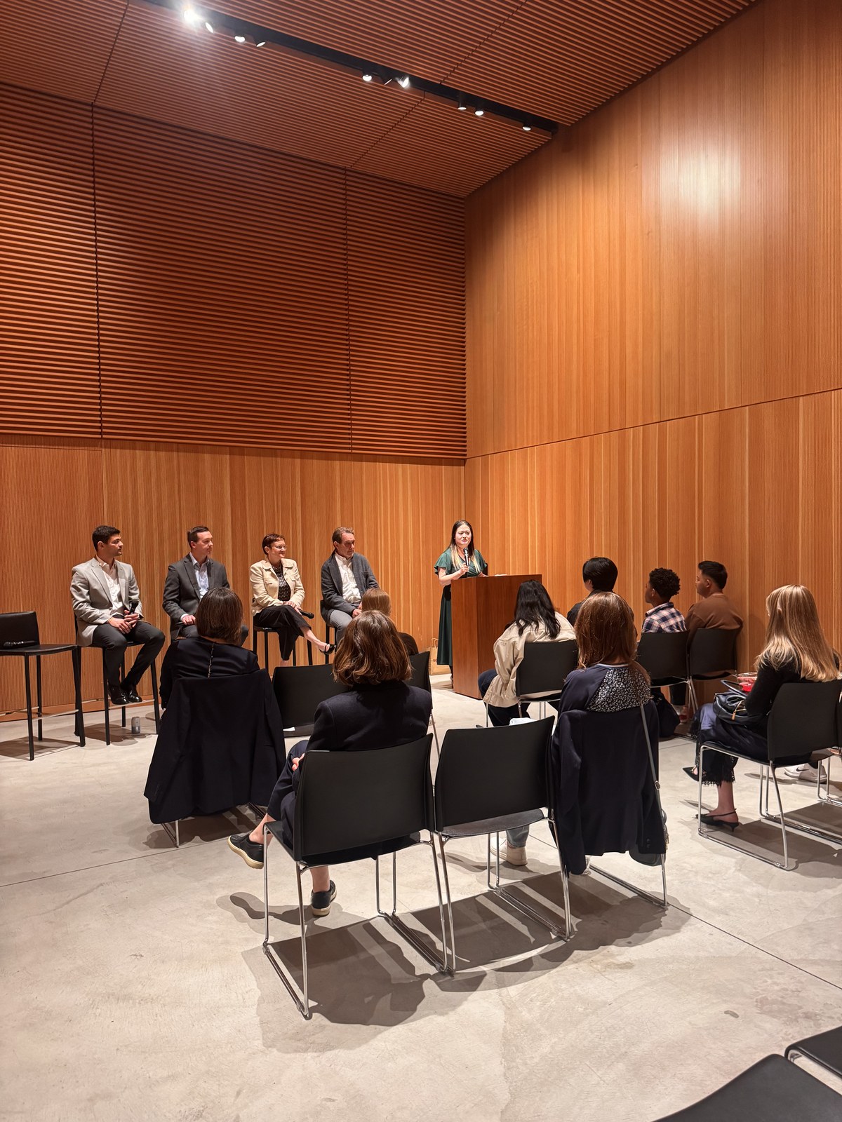 Panelists and students gathered for the discussion